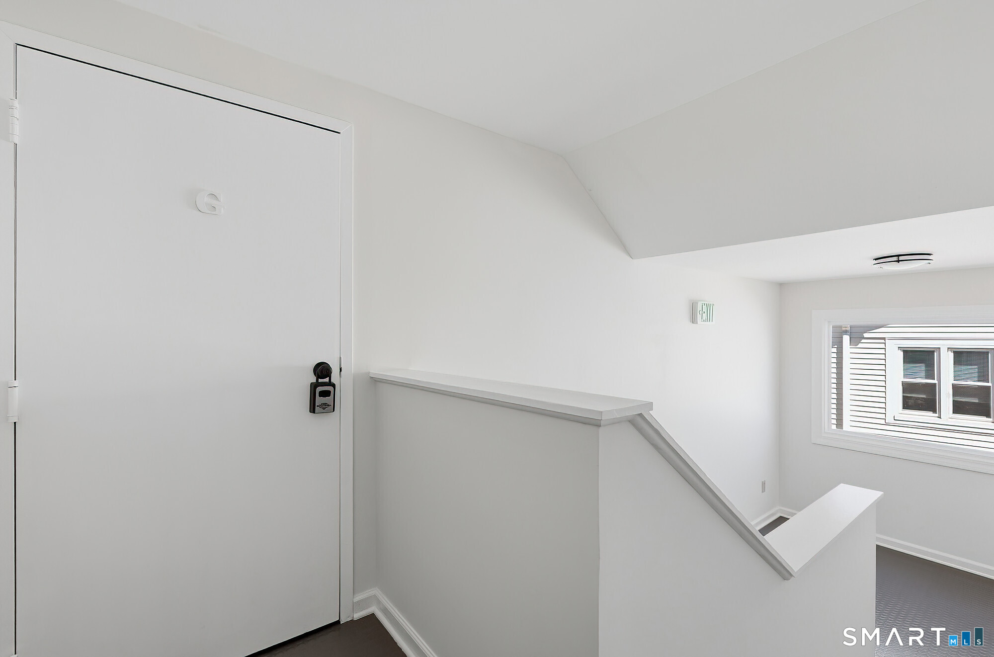 426 Main Street, Unit G Ridgefield, CT 06877 - Photo 23 of 24 a view of small space with hallway