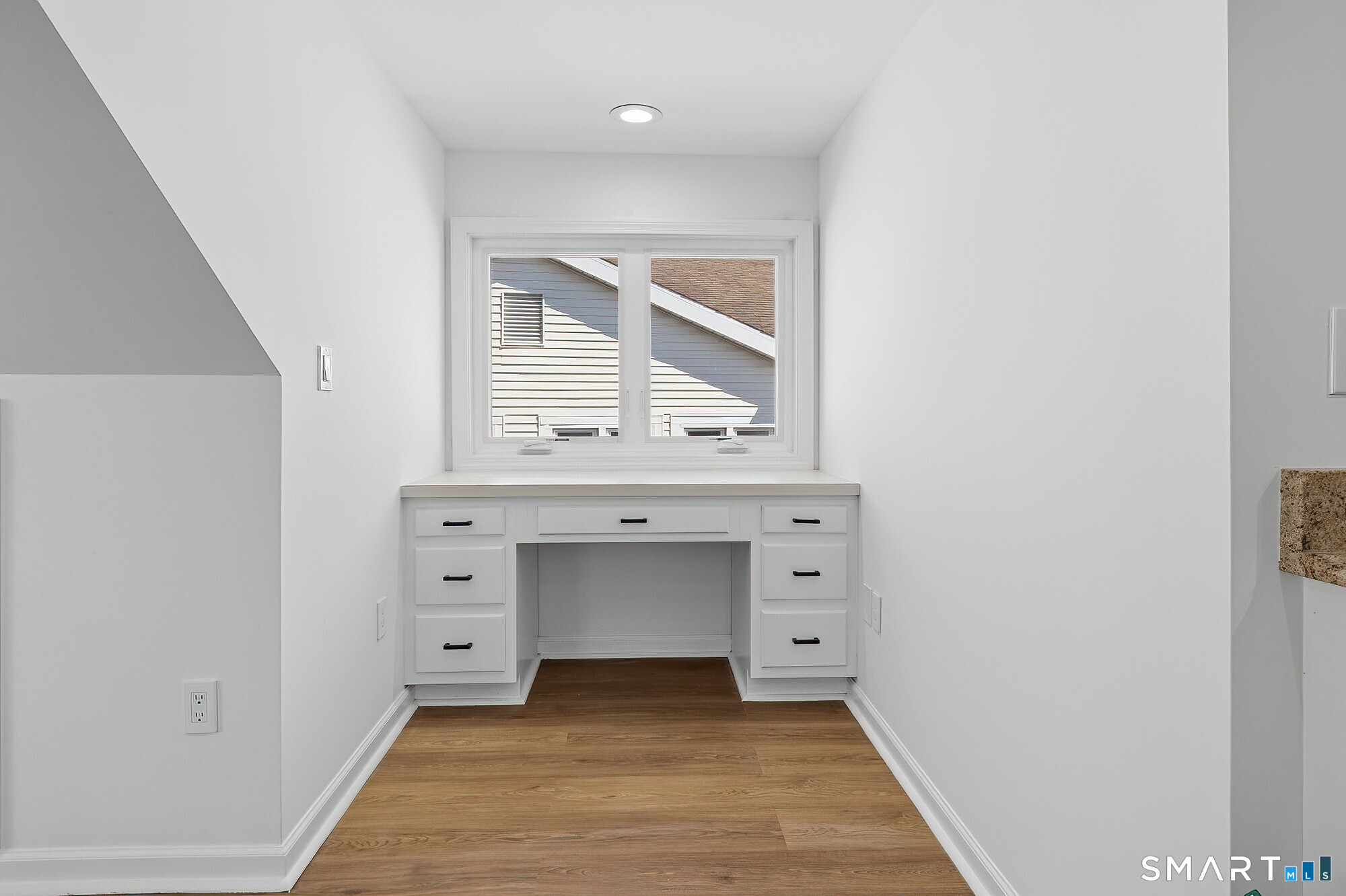 426 Main Street, Unit G Ridgefield, CT 06877 - Photo 8 of 24 wooden floor with window in it
