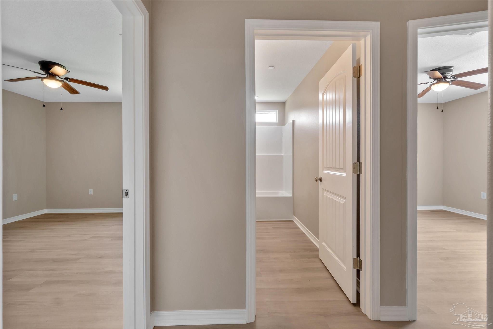 50 Fulton Avenue Pensacola, FL 32503 - Photo 13 of 22 a view of a hallway with wooden floor