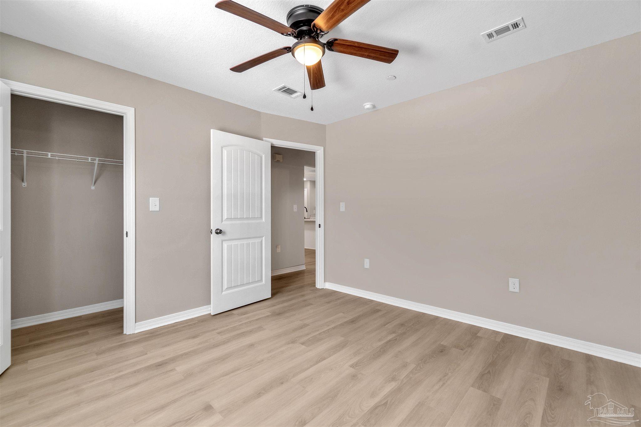 50 Fulton Avenue Pensacola, FL 32503 - Photo 16 of 22 wooden floor in an empty room