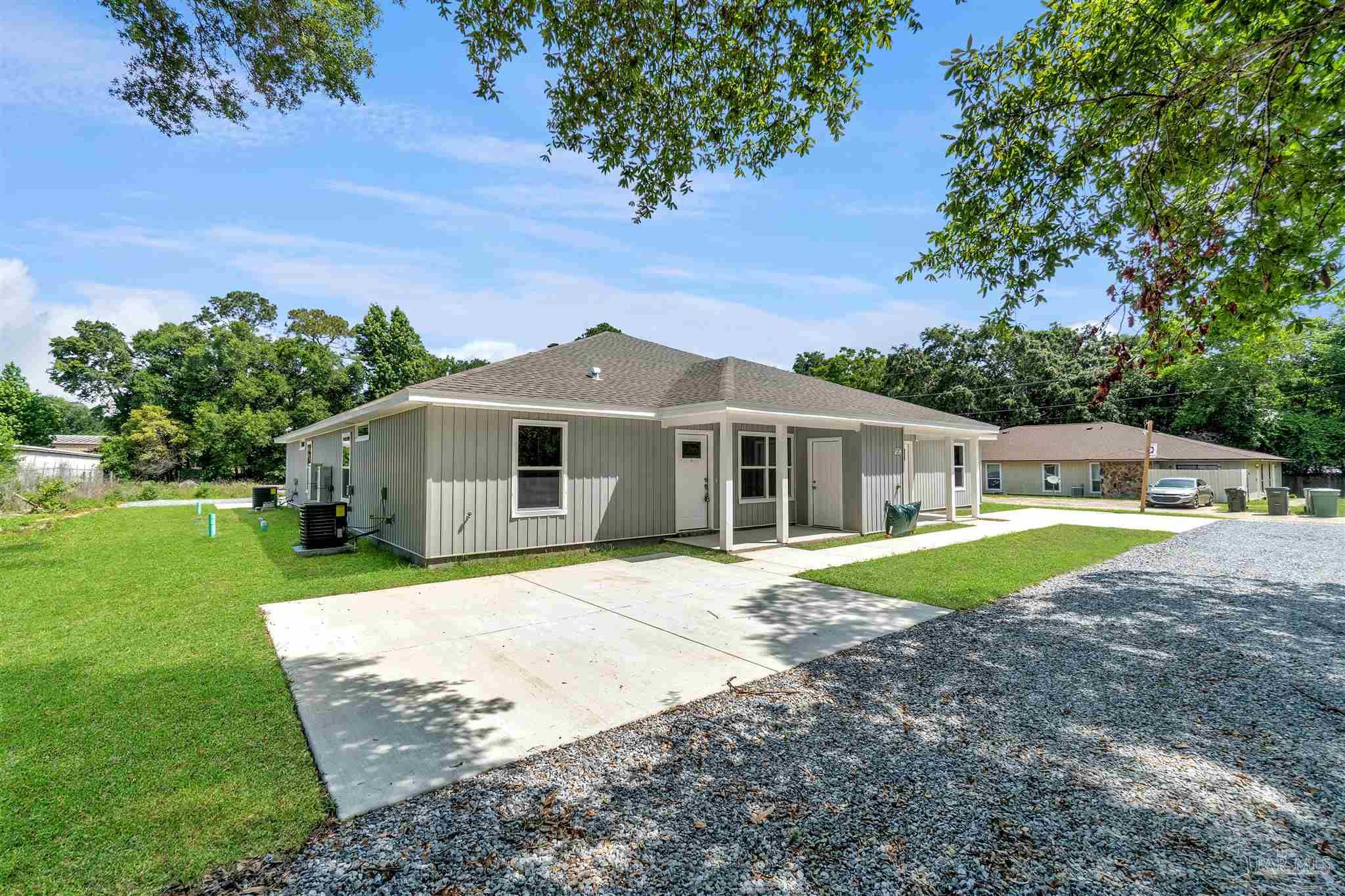 50 Fulton Avenue Pensacola, FL 32503 - Photo 22 of 22 a front view of a house with a yard