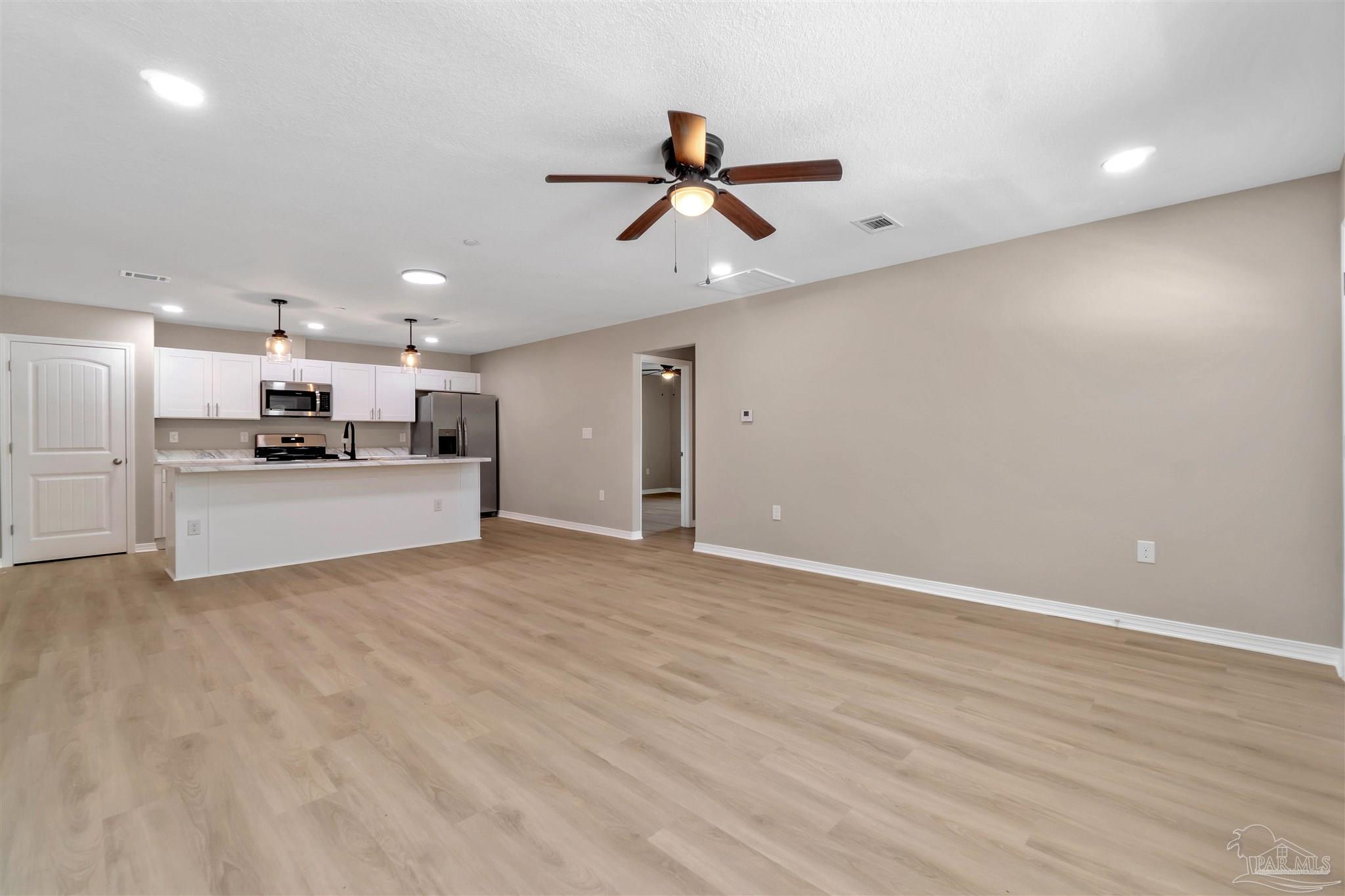 50 Fulton Avenue Pensacola, FL 32503 - Photo 4 of 22 a view of a kitchen with a sink and a window