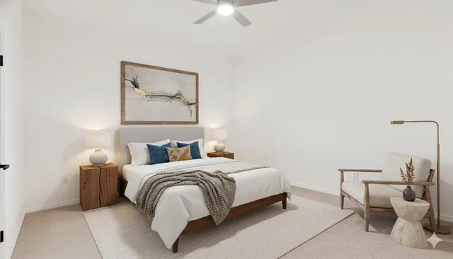 an empty room with a ceiling fan and windows