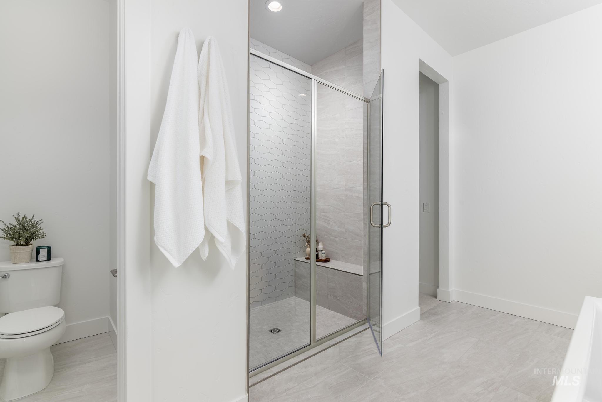 5318 Sparky Avenue Caldwell, ID 83607 - Photo 8 of 11 Full bath with toilet and a shower stall