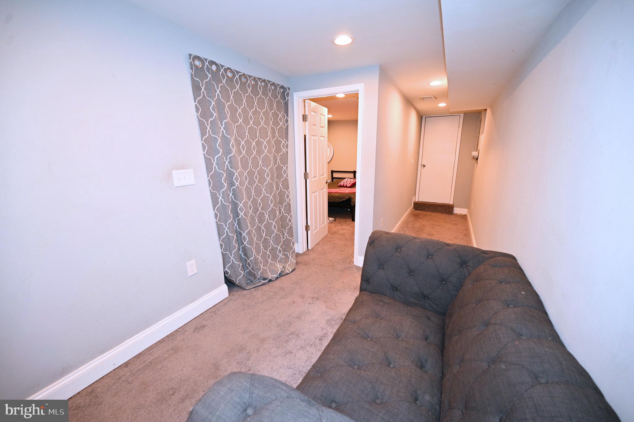 3700 Flowerton Road Baltimore, MD 21229 - Photo 25 of 30 a living room with furniture and a ceiling fan