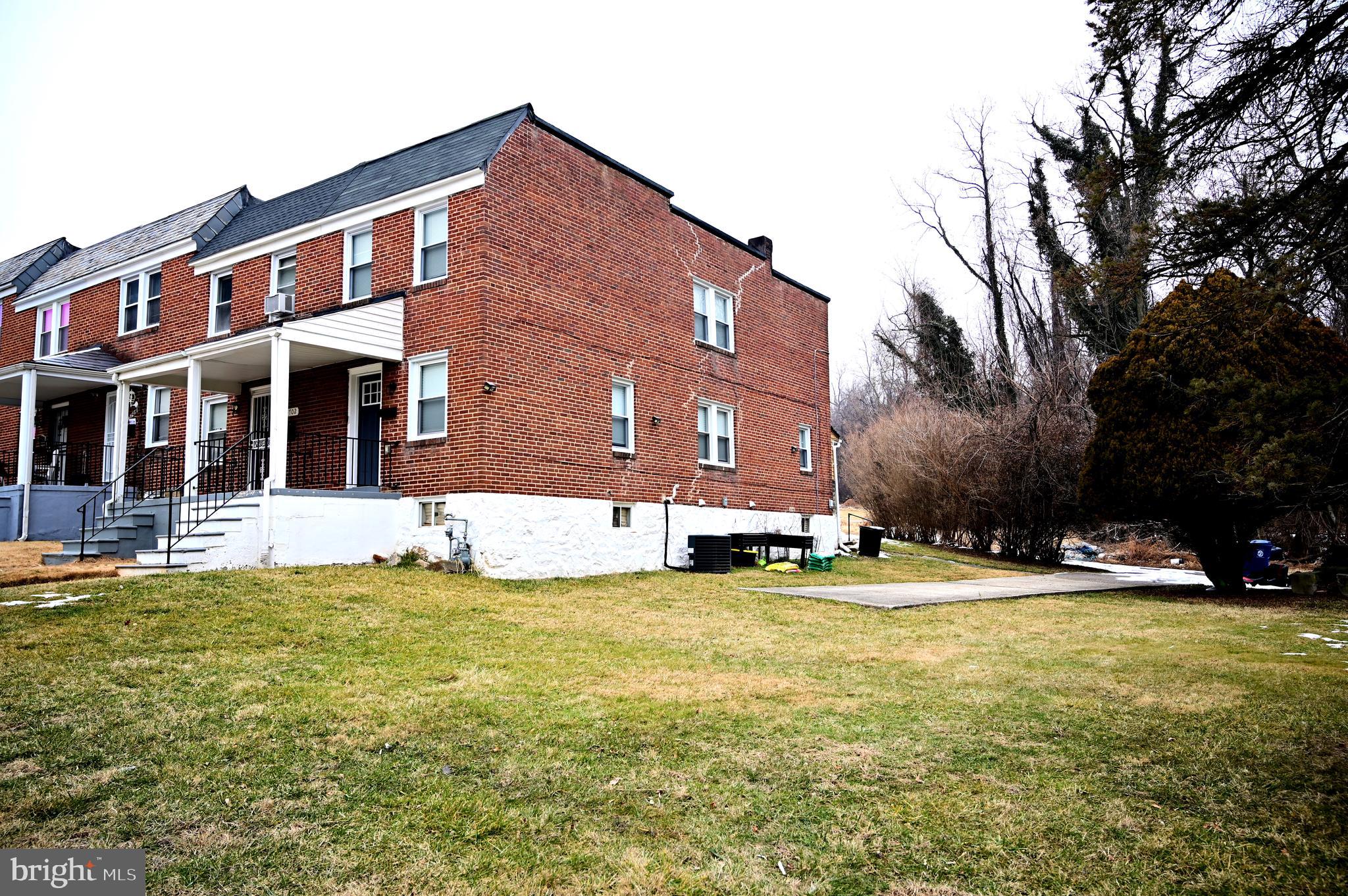 3700 Flowerton Road Baltimore, MD 21229 - Photo 29 of 30 a view of a building with a yard
