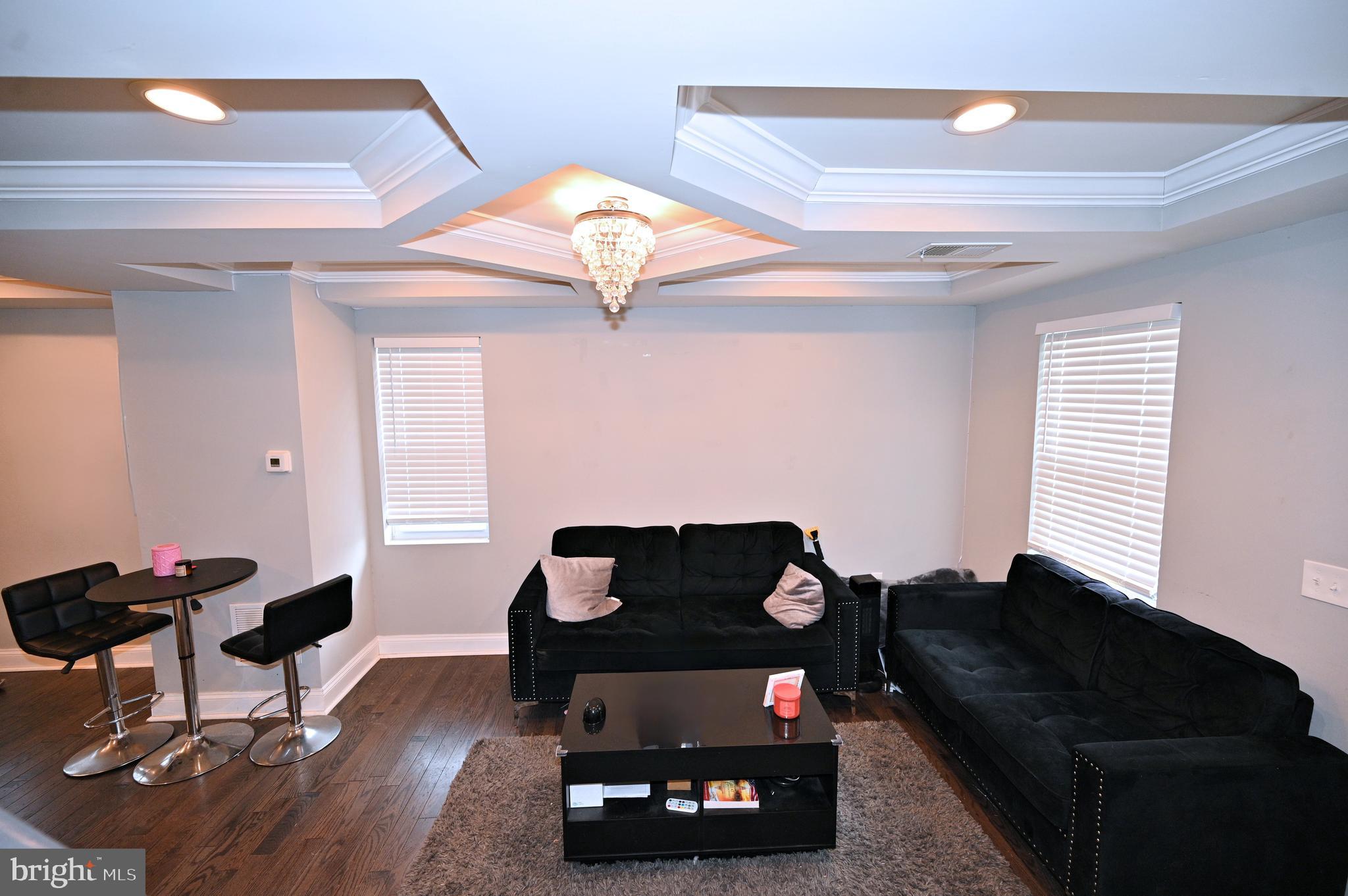 3700 Flowerton Road Baltimore, MD 21229 - Photo 7 of 30 a living room with furniture and a window