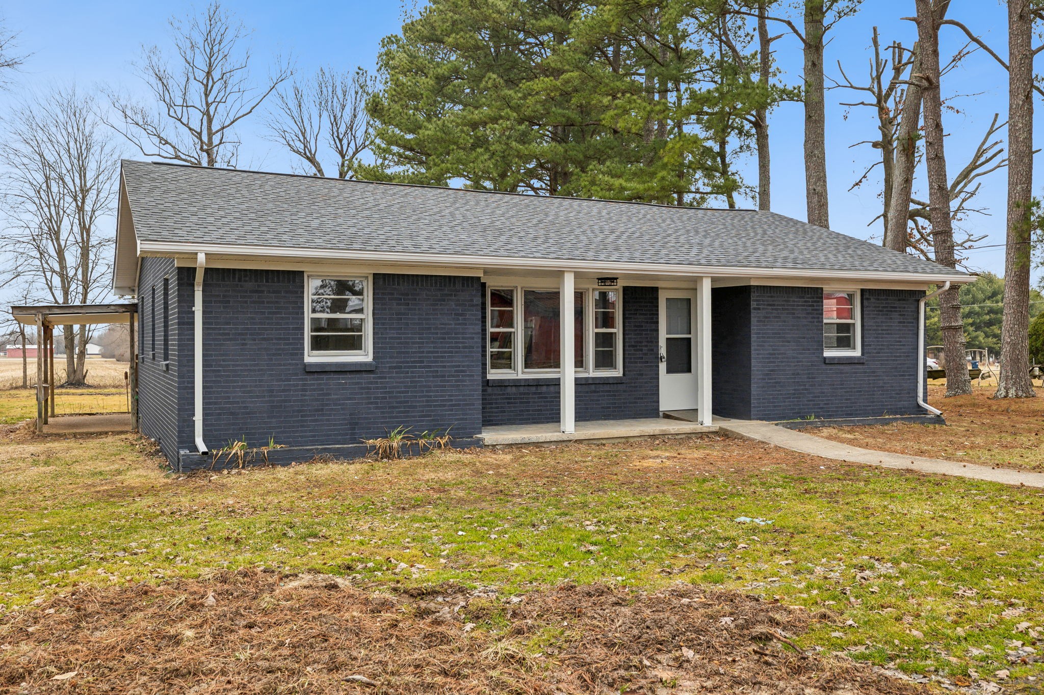 502 Browns Road Lafayette, TN 37083 - Photo 2 of 50 a house that has a tree in front of it