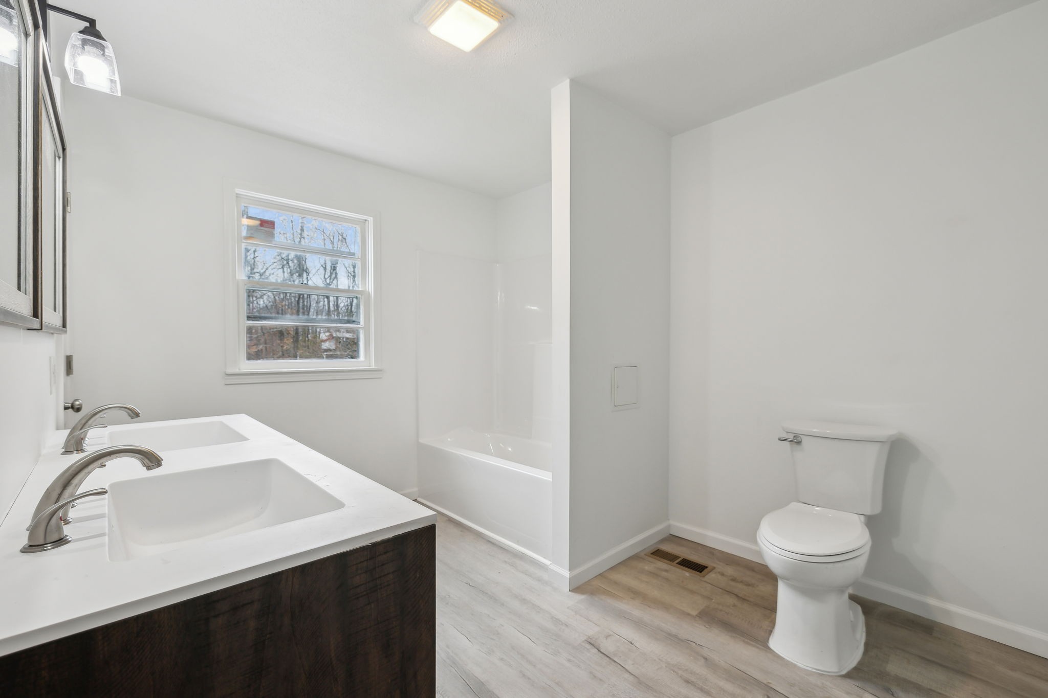 502 Browns Road Lafayette, TN 37083 - Photo 22 of 50 a bathroom with a sink toilet and shower
