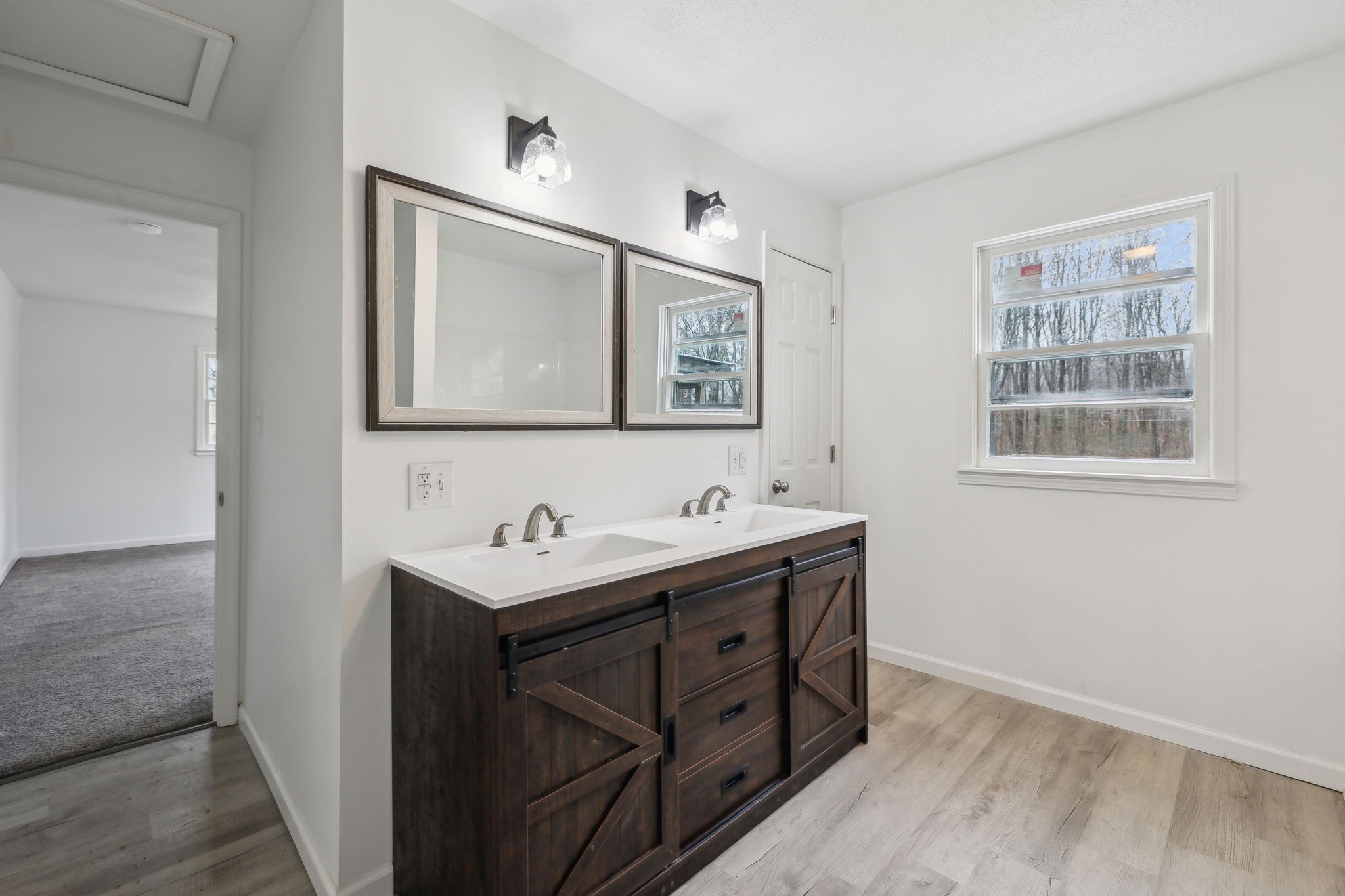 502 Browns Road Lafayette, TN 37083 - Photo 23 of 50 a bathroom with a sink and a mirror