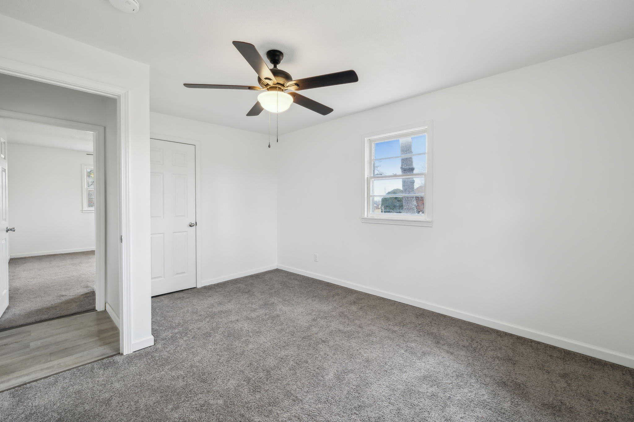 502 Browns Road Lafayette, TN 37083 - Photo 28 of 50 an empty room with windows and fan