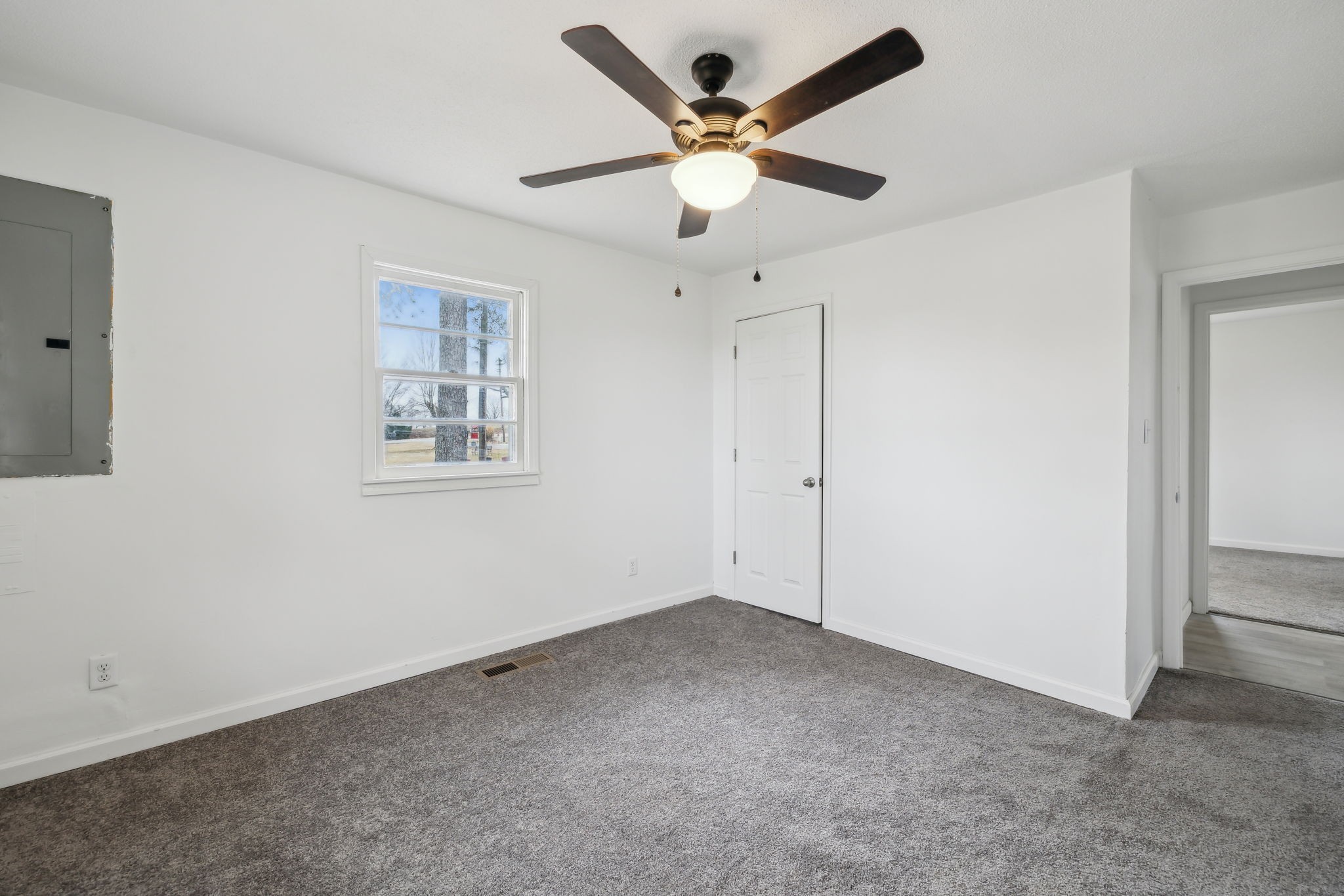 502 Browns Road Lafayette, TN 37083 - Photo 32 of 50 a view of an empty room with a ceiling fan