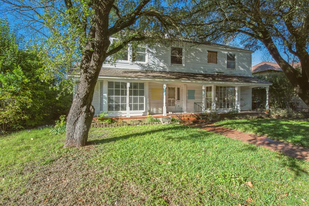 404 Forrest Avenue Cleburne, TX 76033 - Photo 2 of 27 View of front of property with a front lawn and covered porch