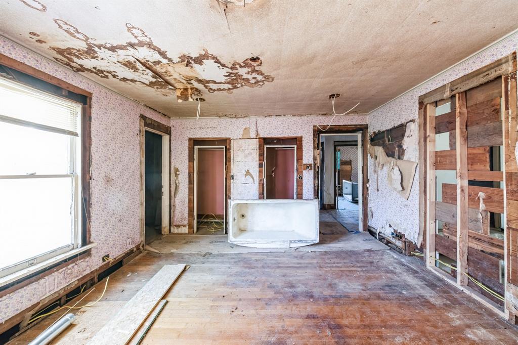 404 Forrest Avenue Cleburne, TX 76033 - Photo 21 of 27 Unfurnished room with hardwood / wood-style floors