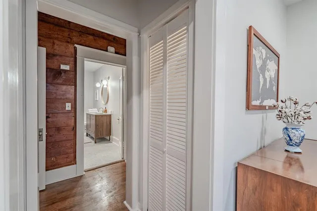 a view of a bathroom from a hallway