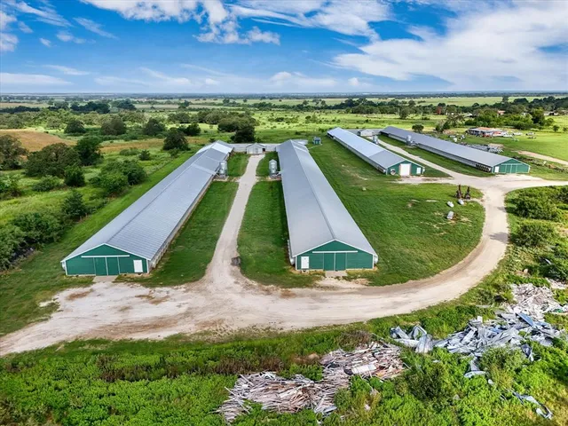 a view of a back yard of a house