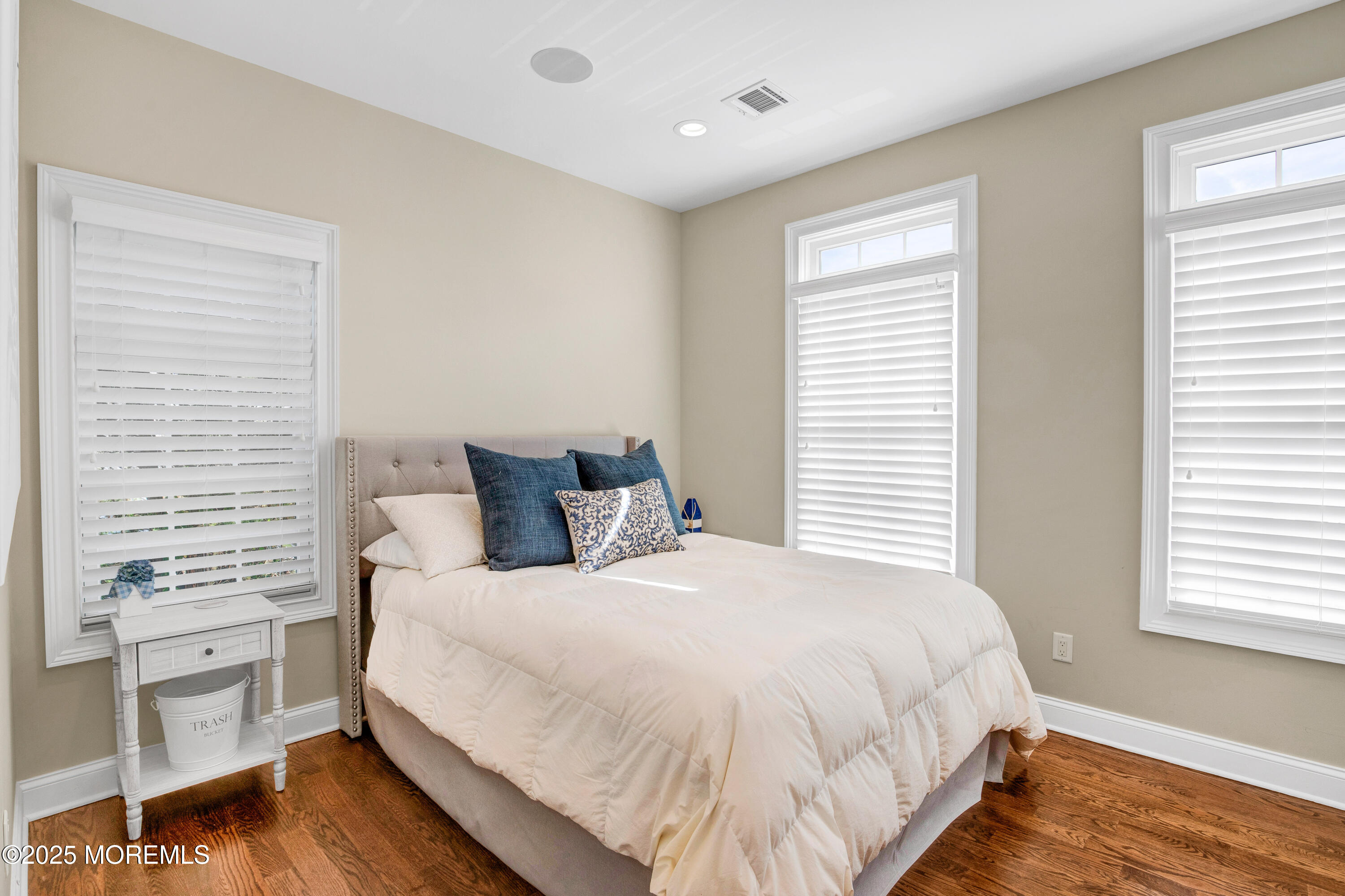 206 North Lagoon Road, Unit SUMMER 2026 Lavallette, NJ 08735 - Photo 16 of 50 a large white bed in a white room