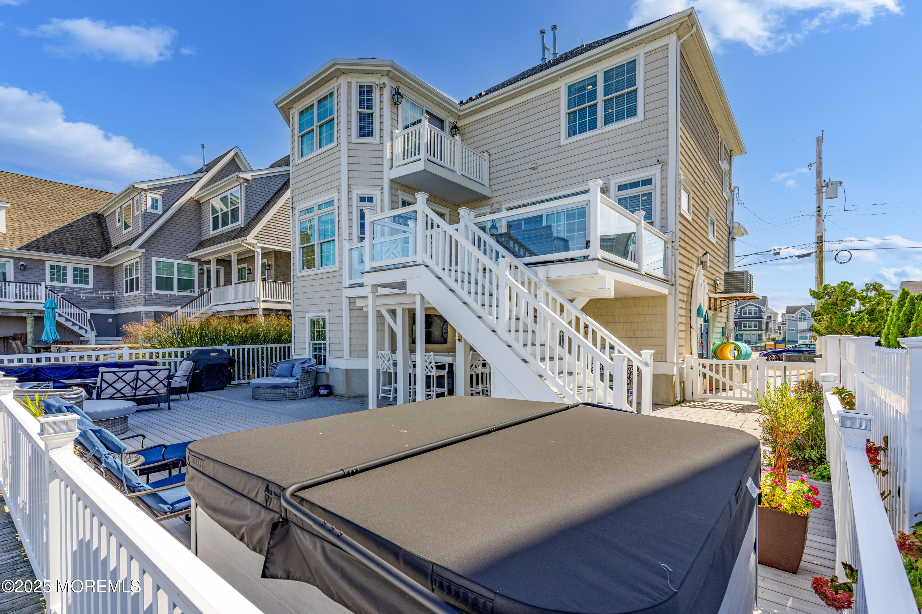 206 North Lagoon Road, Unit SUMMER 2026 Lavallette, NJ 08735 - Photo 24 of 50 a view of a building with many windows