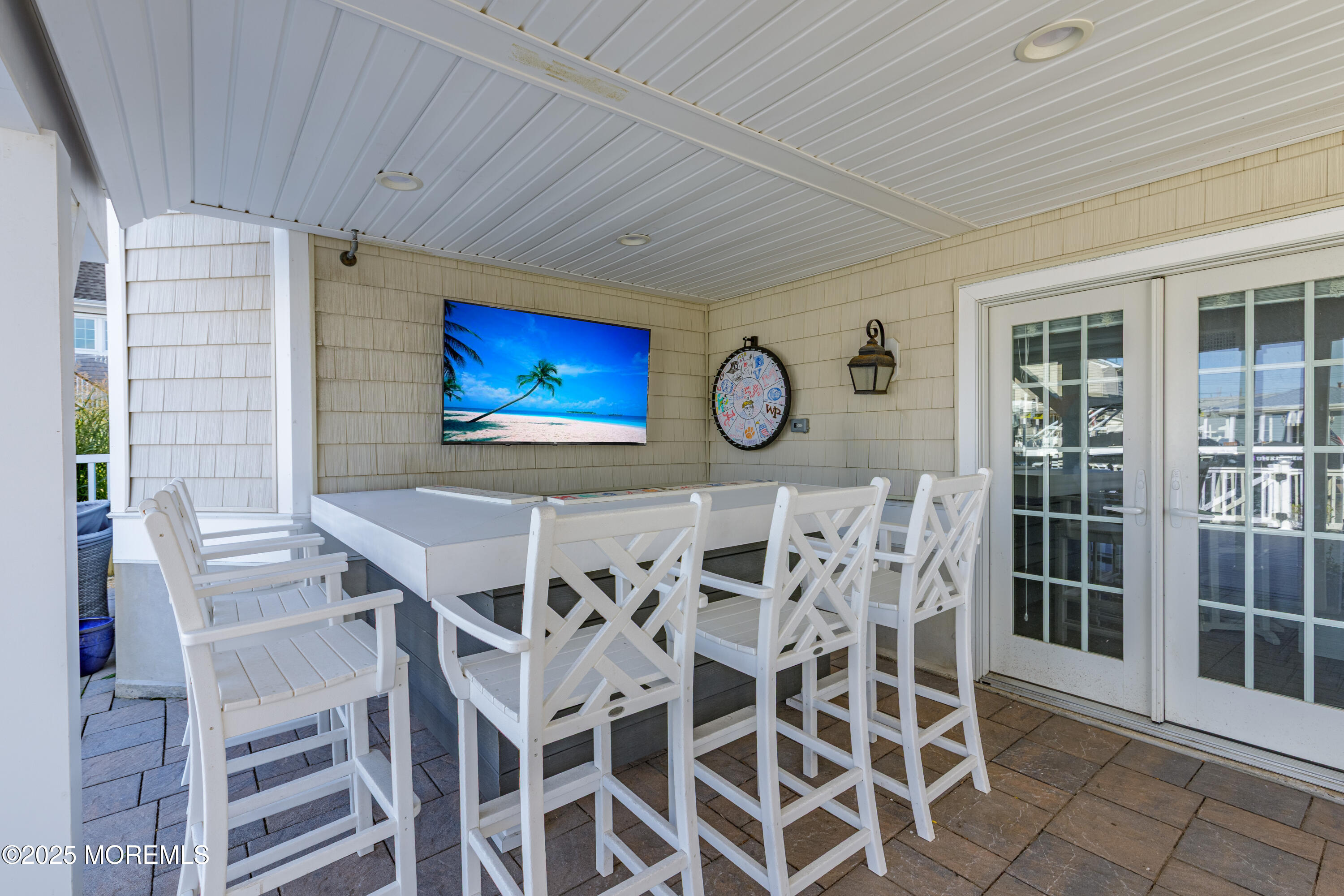 206 North Lagoon Road, Unit SUMMER 2026 Lavallette, NJ 08735 - Photo 26 of 50 a view of a livingroom with furniture and window