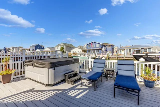 a view of a balcony with furniture