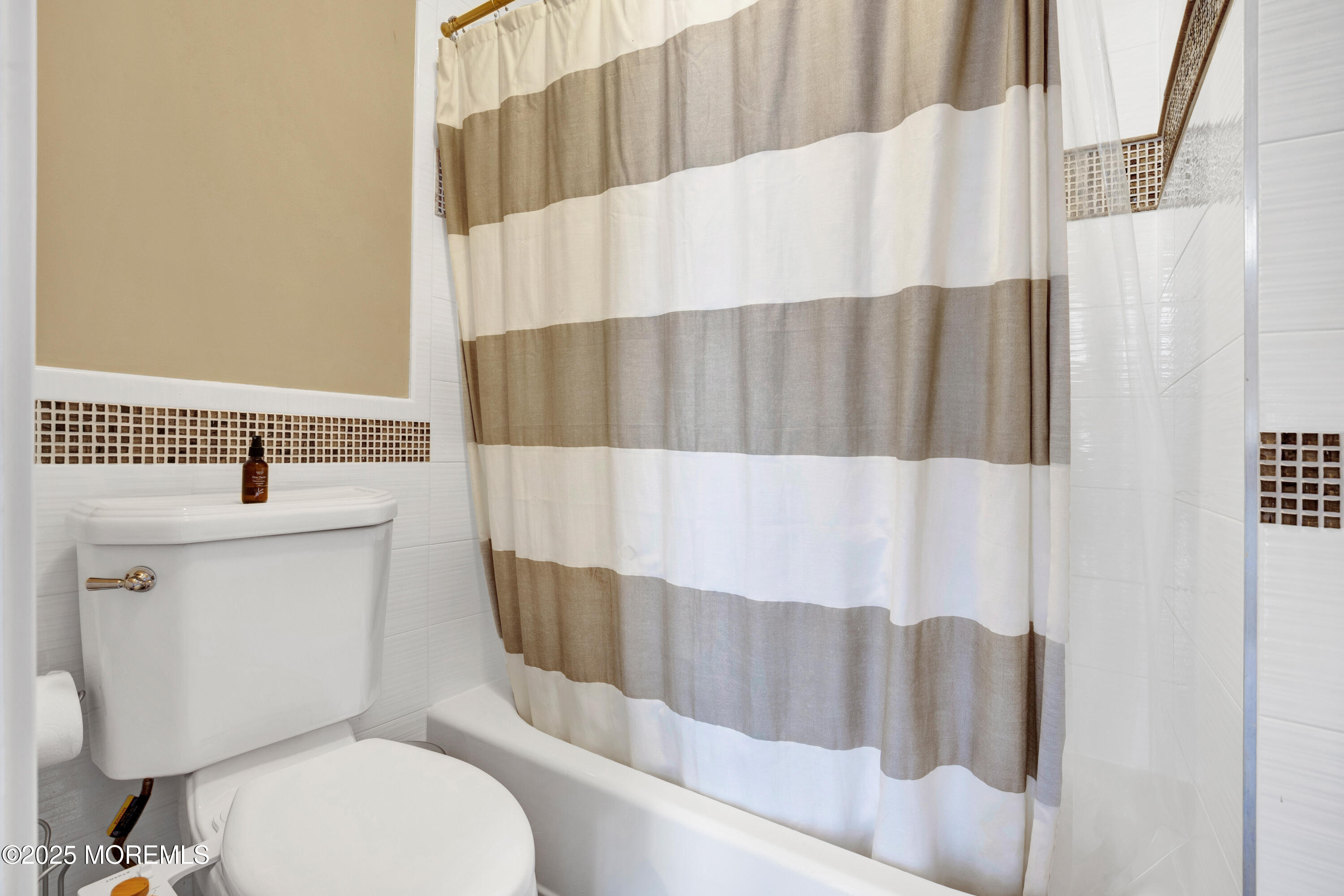 206 North Lagoon Road, Unit SUMMER 2026 Lavallette, NJ 08735 - Photo 44 of 50 a bathroom with a toilet and a sink