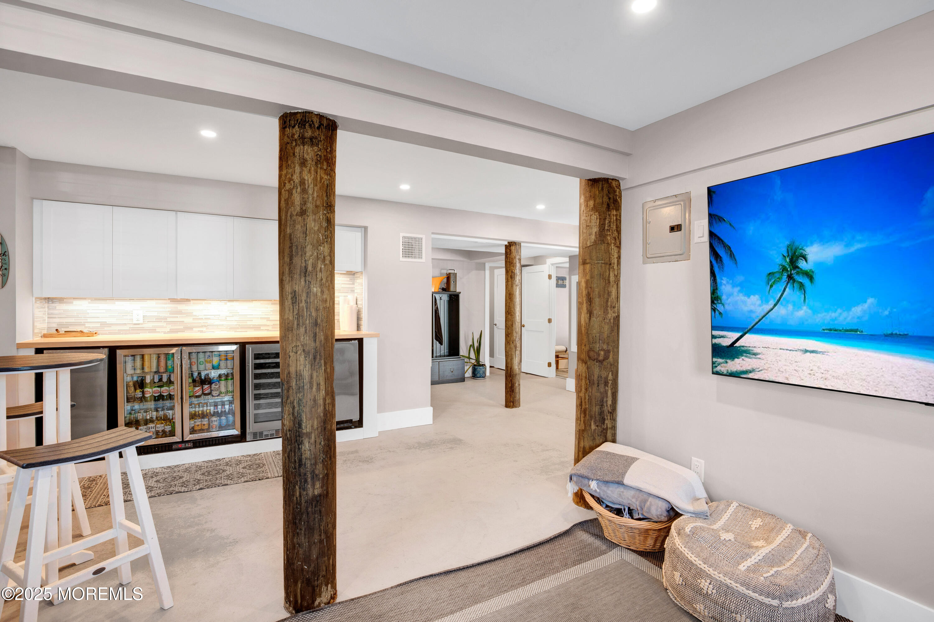206 North Lagoon Road, Unit SUMMER 2026 Lavallette, NJ 08735 - Photo 47 of 50 a view of a hallway with furniture and a large window