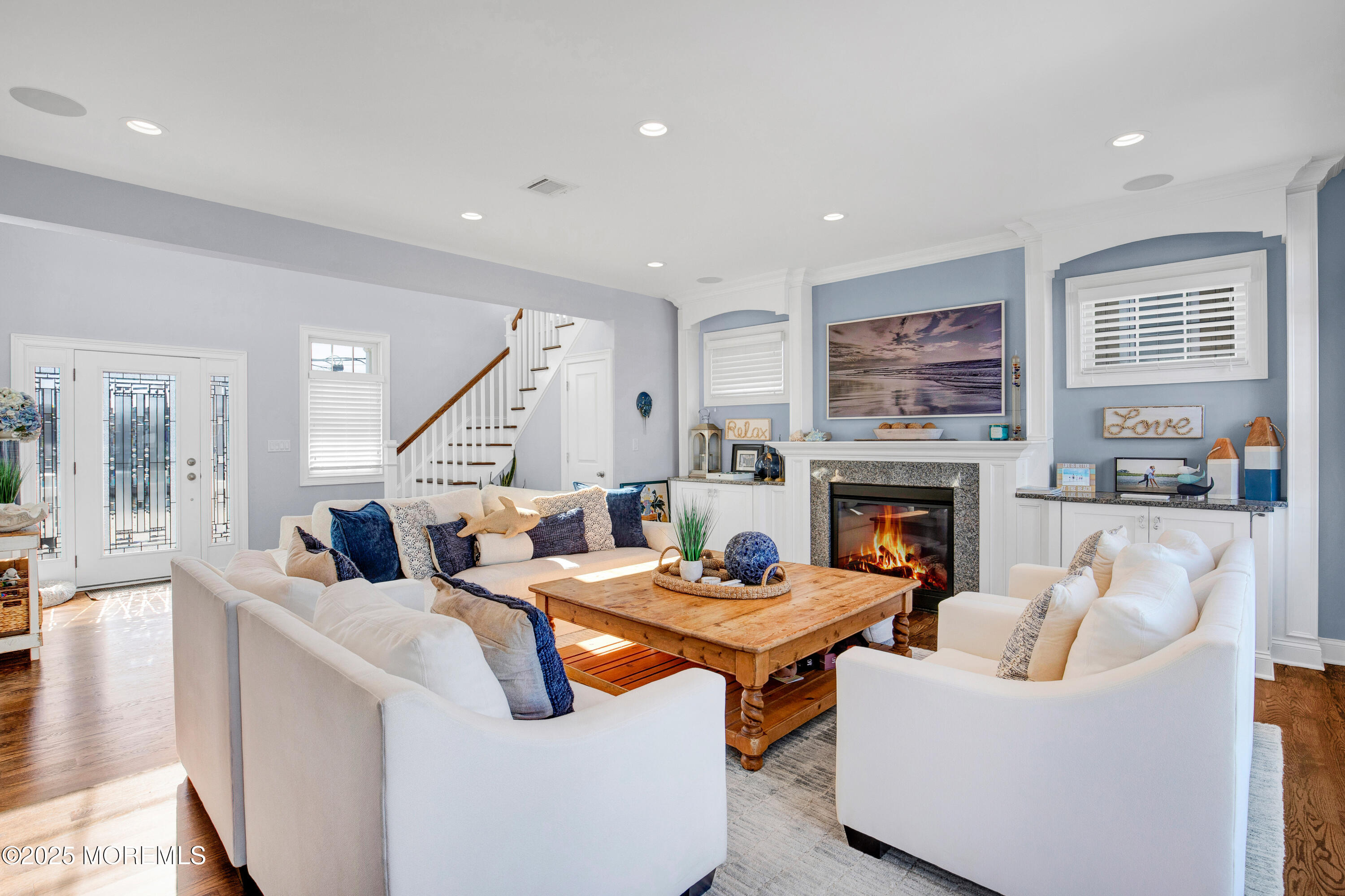 206 North Lagoon Road, Unit SUMMER 2026 Lavallette, NJ 08735 - Photo 6 of 50 a living room with fireplace furniture and a large window