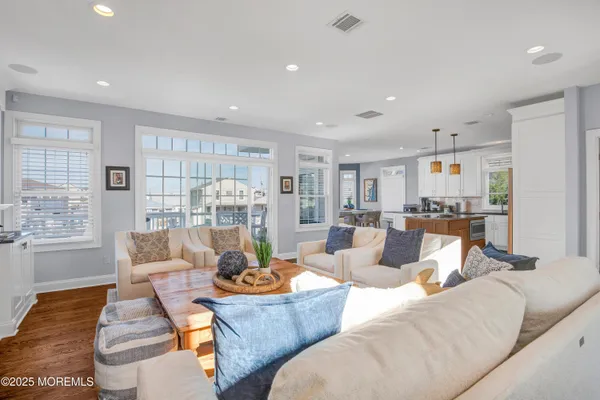 a living room with furniture and a table