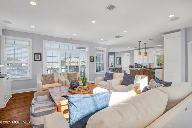 a living room with furniture and a table