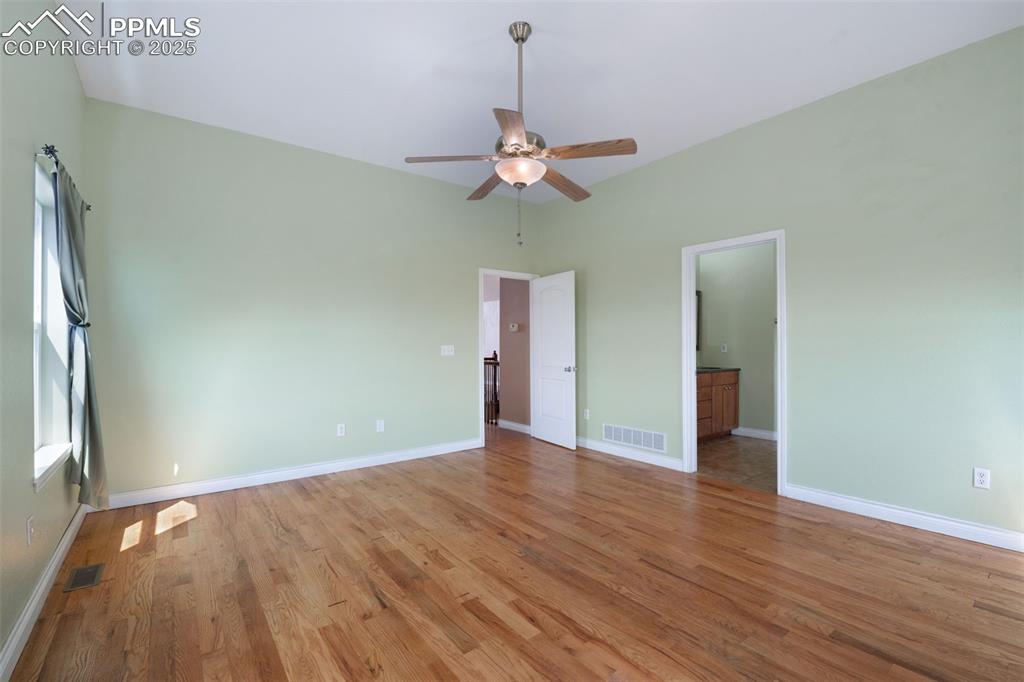 3730 Curtis Road Peyton, CO 80831 - Photo 18 of 50 Hardwood In Primary Bedroom
