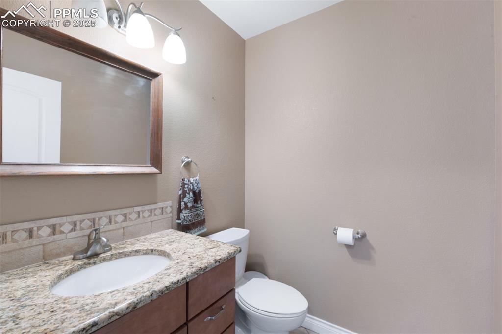 3730 Curtis Road Peyton, CO 80831 - Photo 23 of 50 Powder Room On Main Level