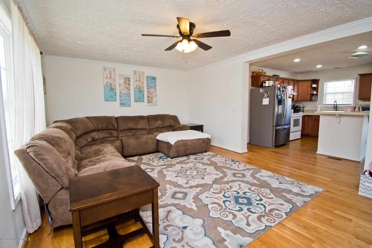 Spacious Living Room : Hardwood Floors