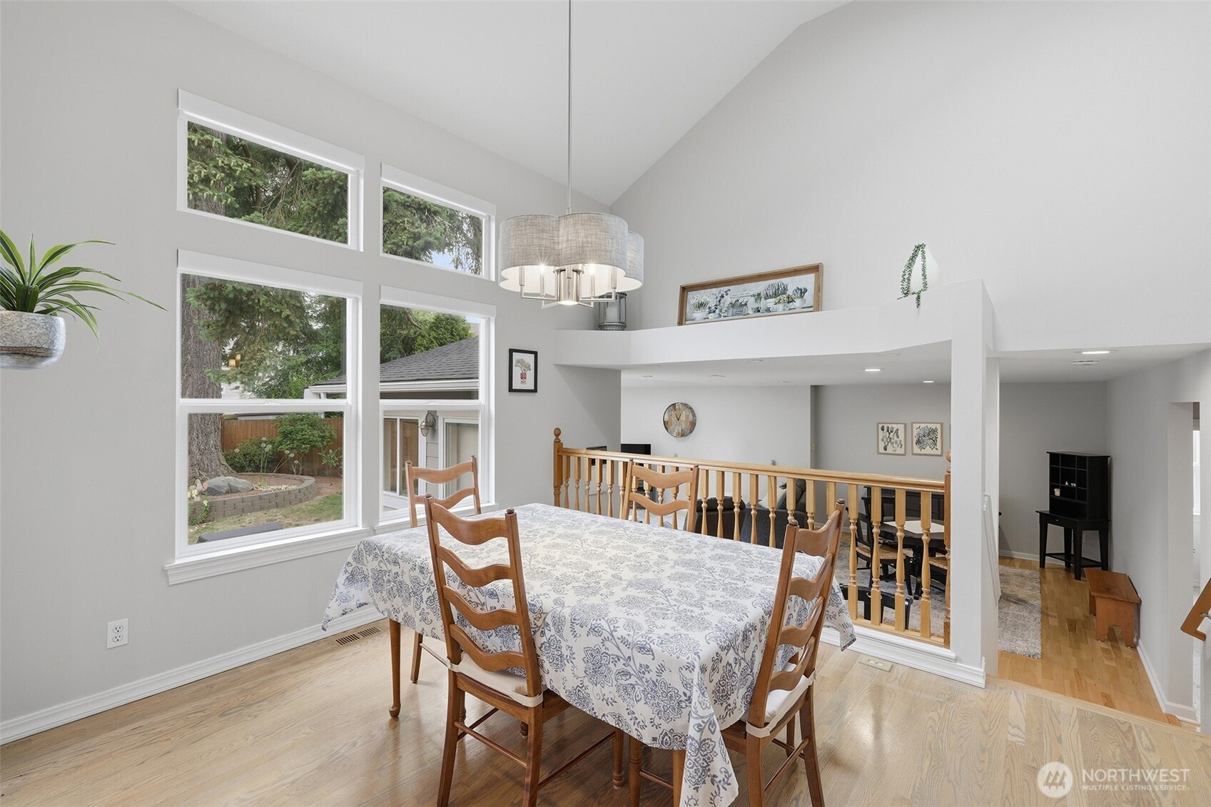 17747 89th Court Northeast Bothell, WA 98011 - Photo 8 of 33 a view of a dining room with furniture window and wooden floor