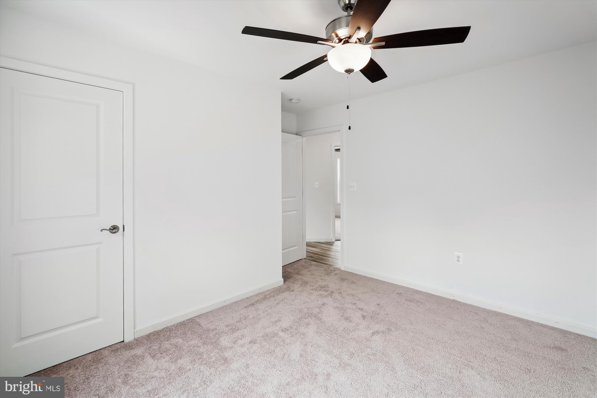 2 Cedar Ridge Road Rapidan, VA 22733 - Photo 43 of 60 an empty room with a ceiling fan and a fan