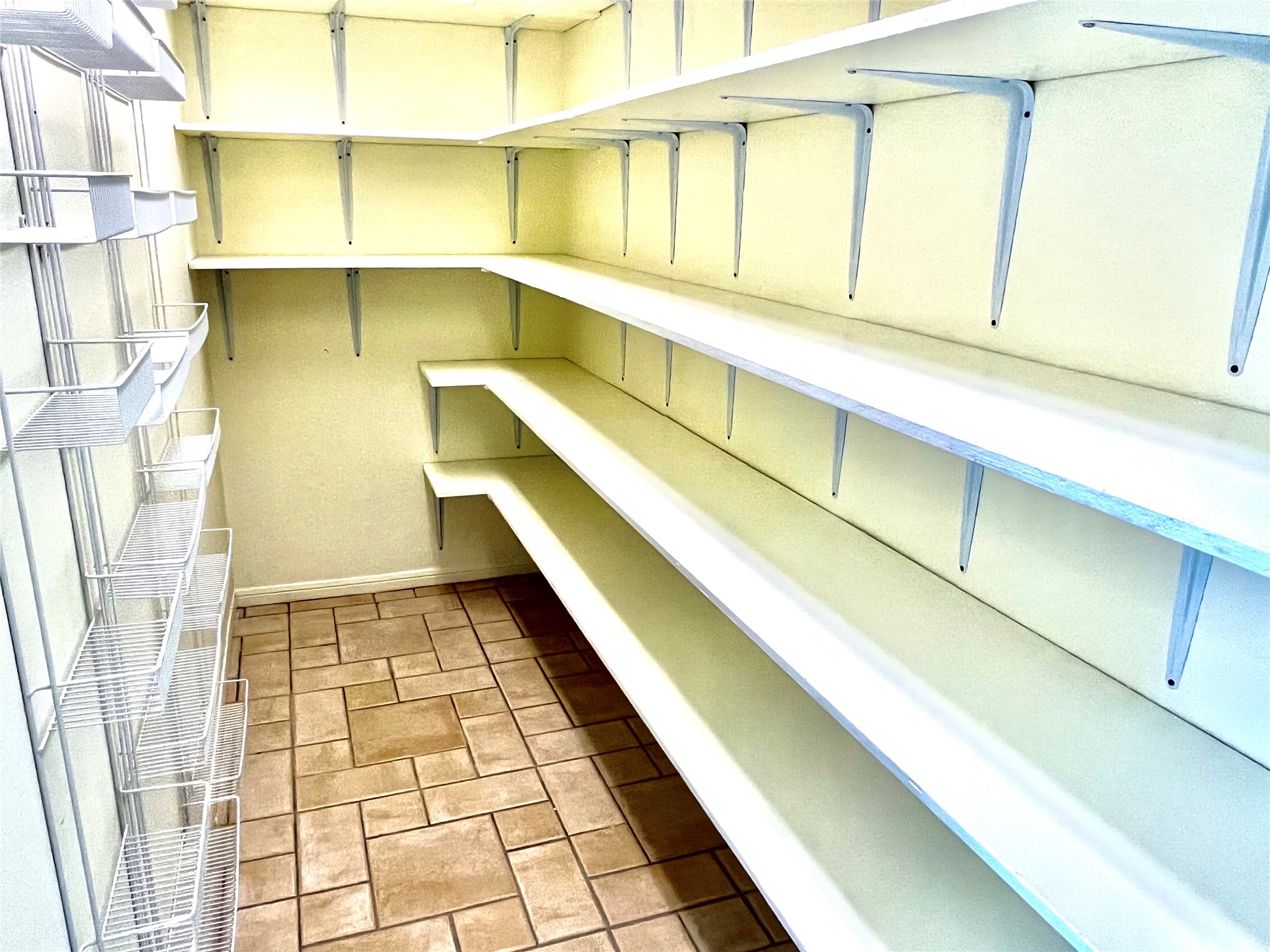37243 FM 521 Road Bay City, TX 77414 - Photo 24 of 50 Large, walk-in closet for the 4th bedroom or "flex room". Lots of shelving and organized storage space!