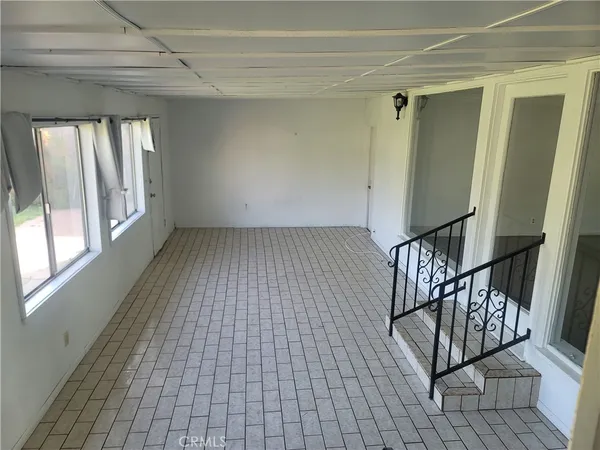 a view of entryway with stairs