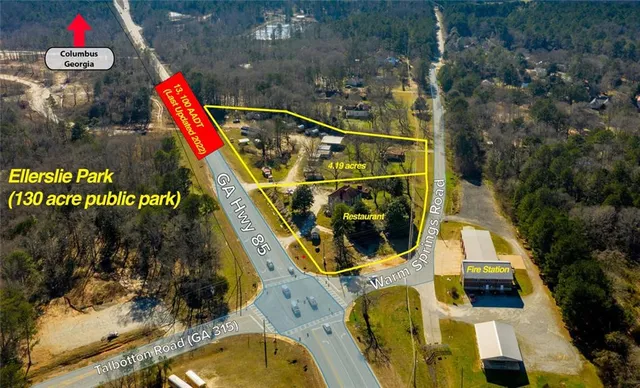 an aerial view of a house with swimming pool