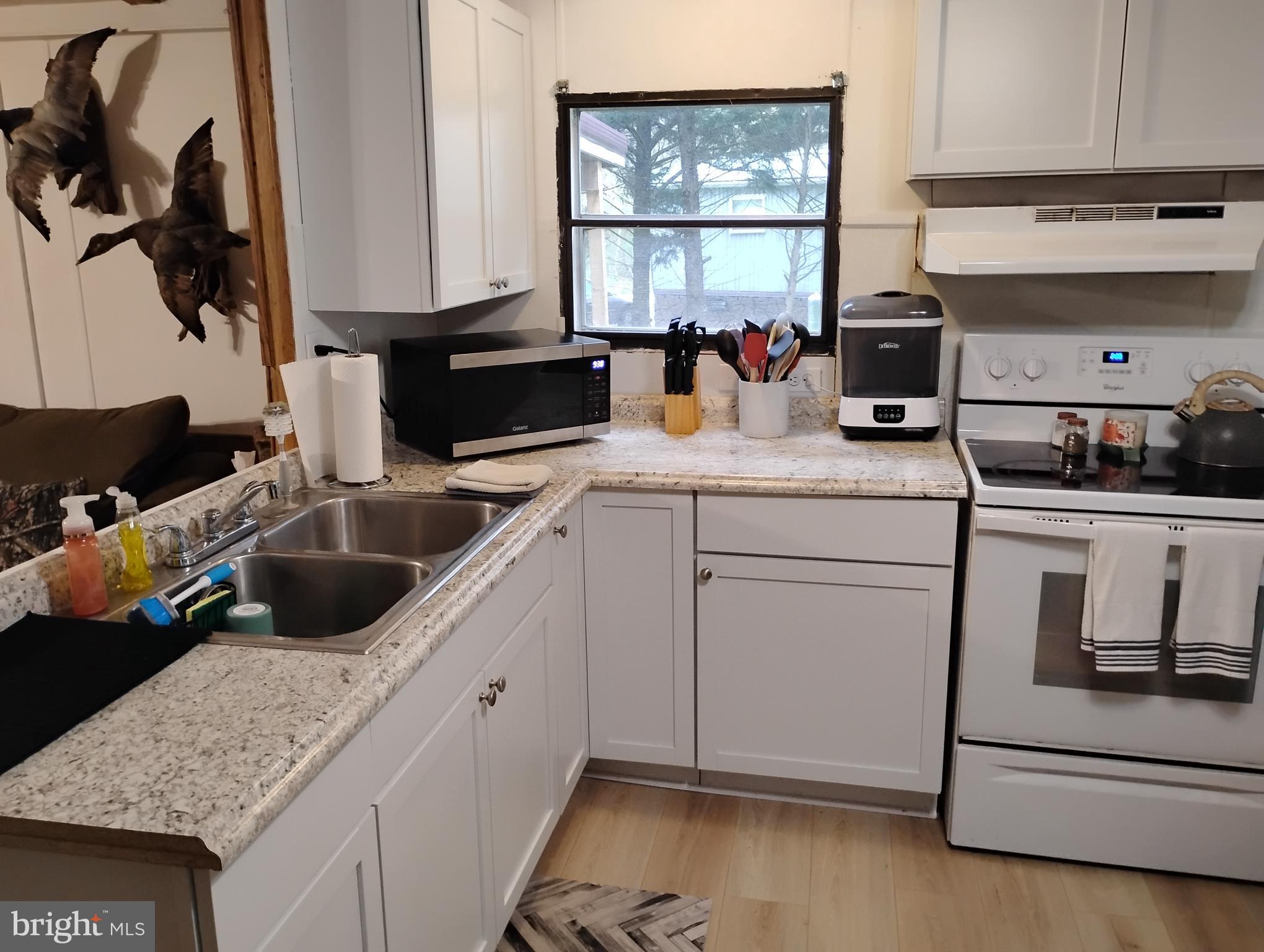 19 Octoraro Rising Sun, MD 21911 - Photo 17 of 24 a kitchen with a sink stove and cabinets