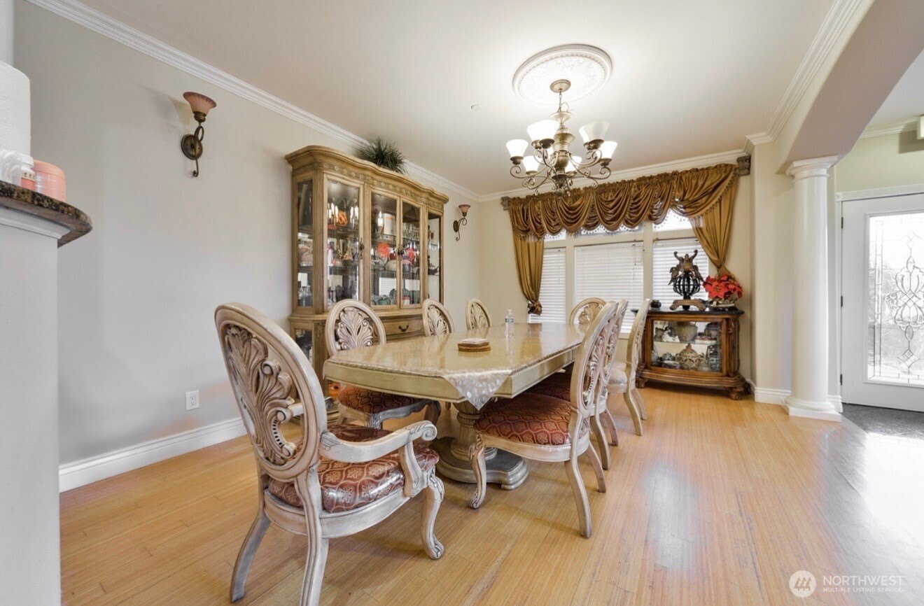 0 124th Kirkland, WA 98034 - Photo 7 of 10 a view of a dining room with furniture and wooden floor