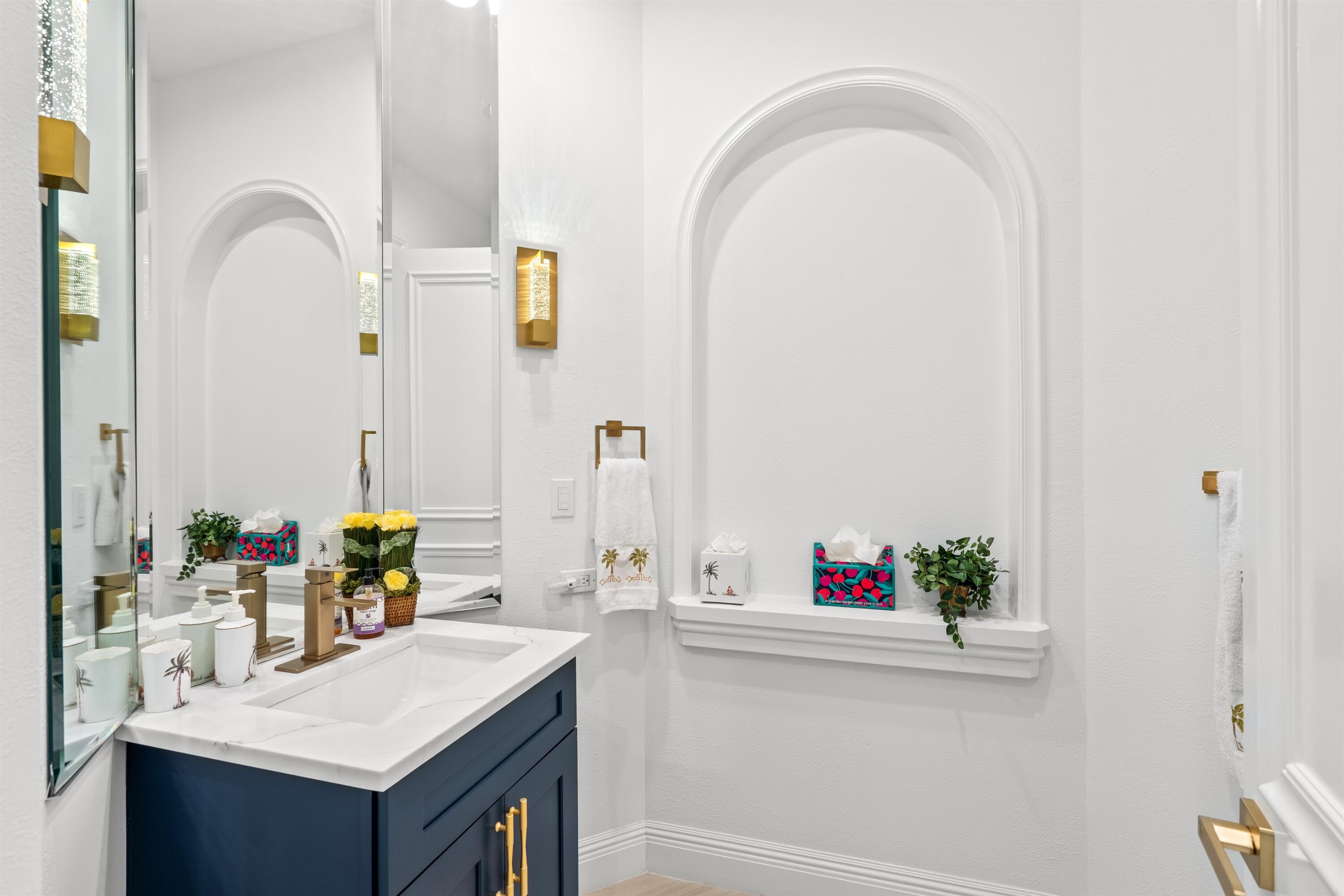 17894 Monte Vista Drive Boca Raton, FL 33496 - Photo 11 of 47 a bathroom with a sink and a mirror