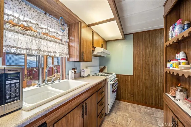 a bathroom with a sink a double vanity and a shower