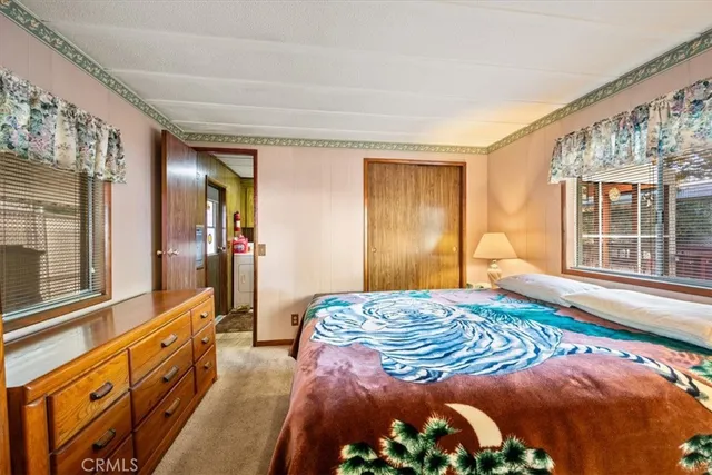 a bathroom with a sink vanity and a mirror