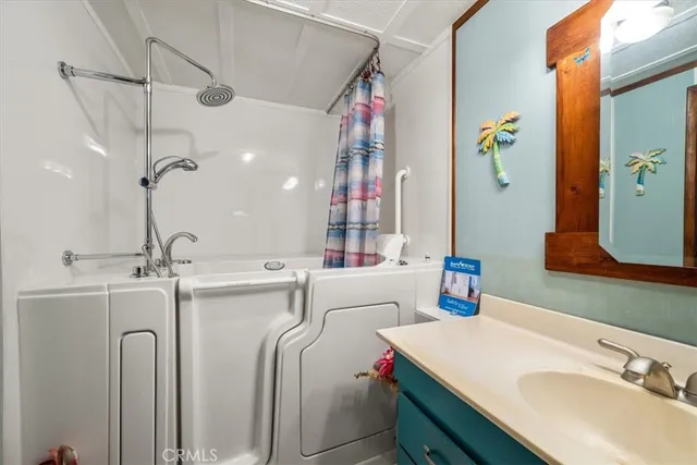 a living room with furniture rug and window