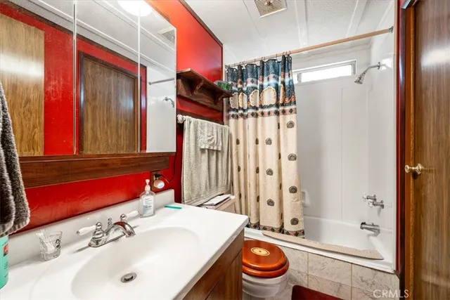 a view of an entryway with furniture and wooden floor