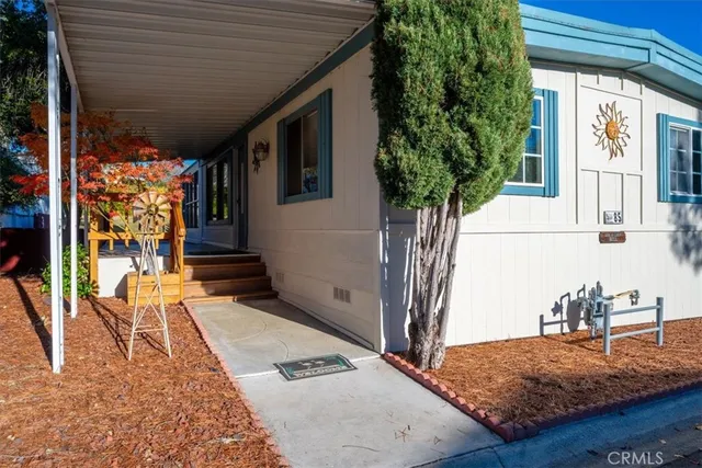 a backyard of a house with seating space