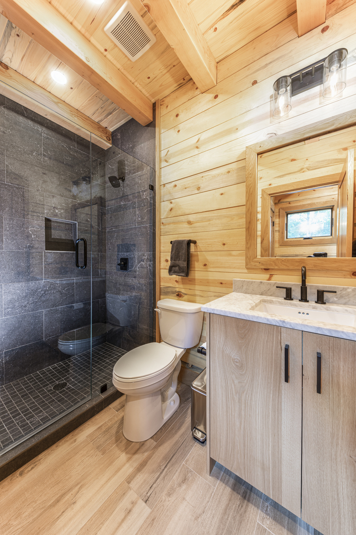 1667 Sherwood Camp Road Dahinda, IL 61428 - Photo 12 of 26 a bathroom with a sink toilet and shower