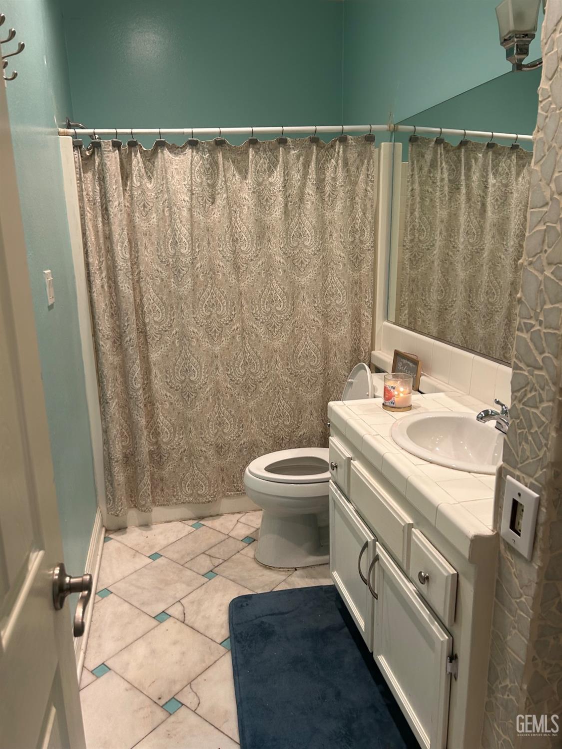 Undisclosed Address Bakersfield, CA 93312 - Photo 13 of 15 a bathroom with a sink a toilet and shower