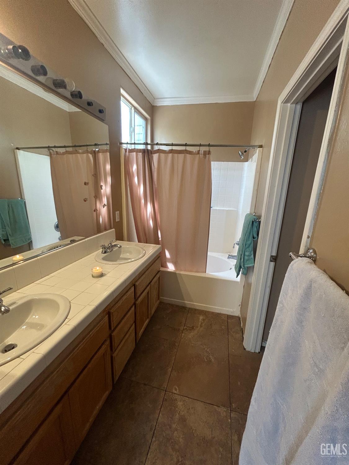 Undisclosed Address Bakersfield, CA 93312 - Photo 15 of 15 a bathroom with a granite countertop sink and a large mirror