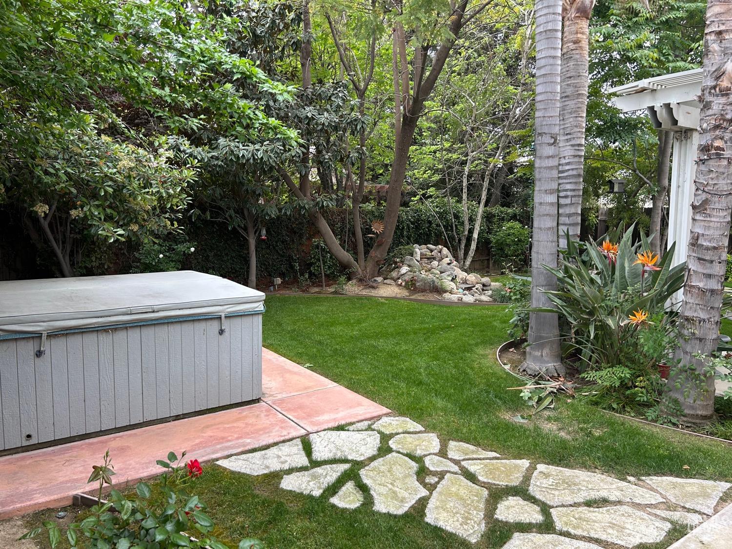 Undisclosed Address Bakersfield, CA 93312 - Photo 6 of 15 a view of a backyard with sitting area