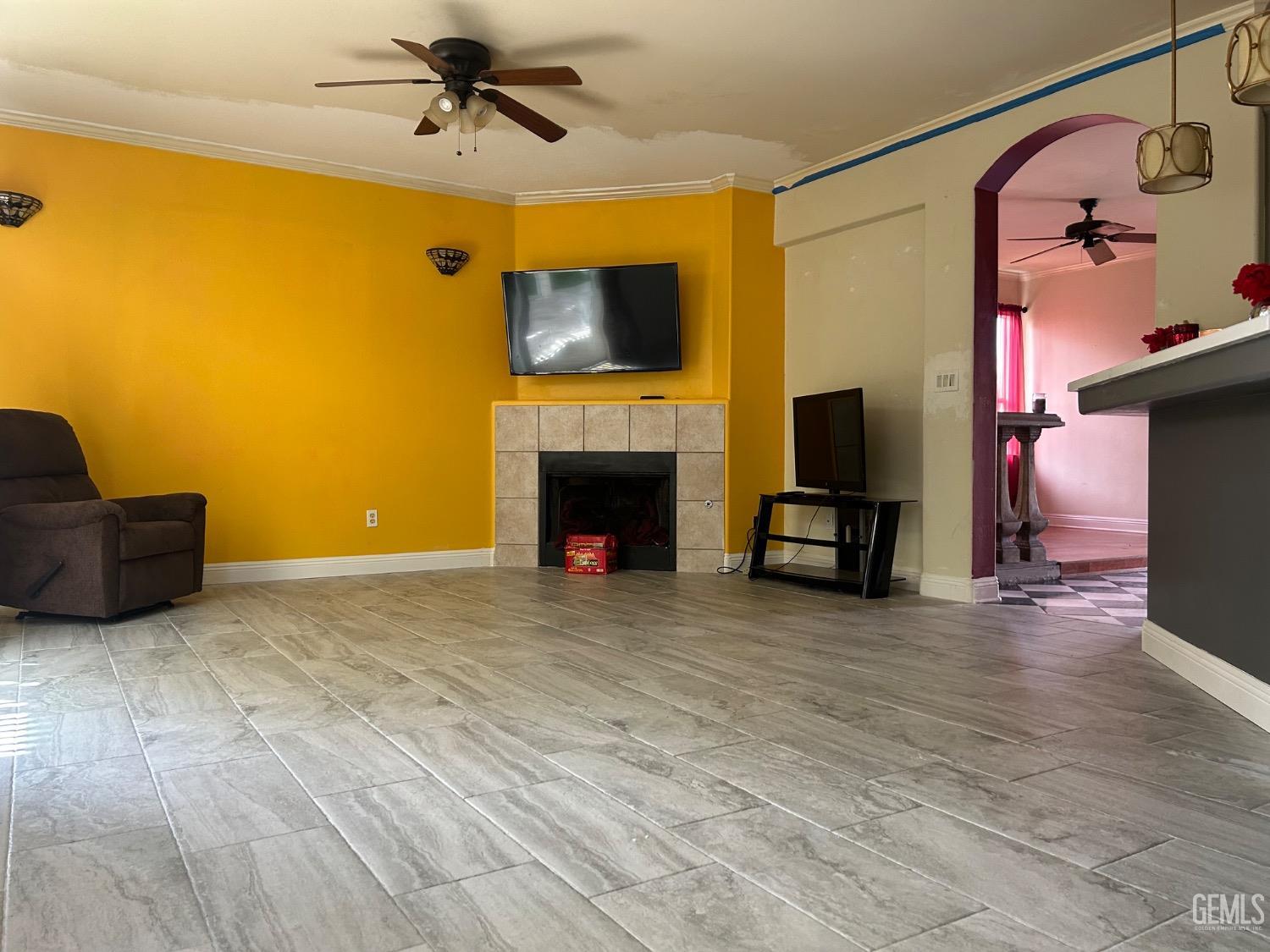 Undisclosed Address Bakersfield, CA 93312 - Photo 8 of 15 a living room with furniture and a fireplace